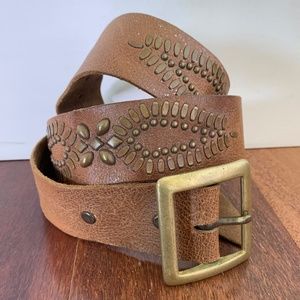 Studded leather belt with brass buckle.